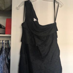 Black dressy dress with one sleeve.